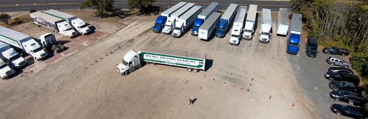 Image of aerial view of DDA truck being driven by a CDL training student on the training yard